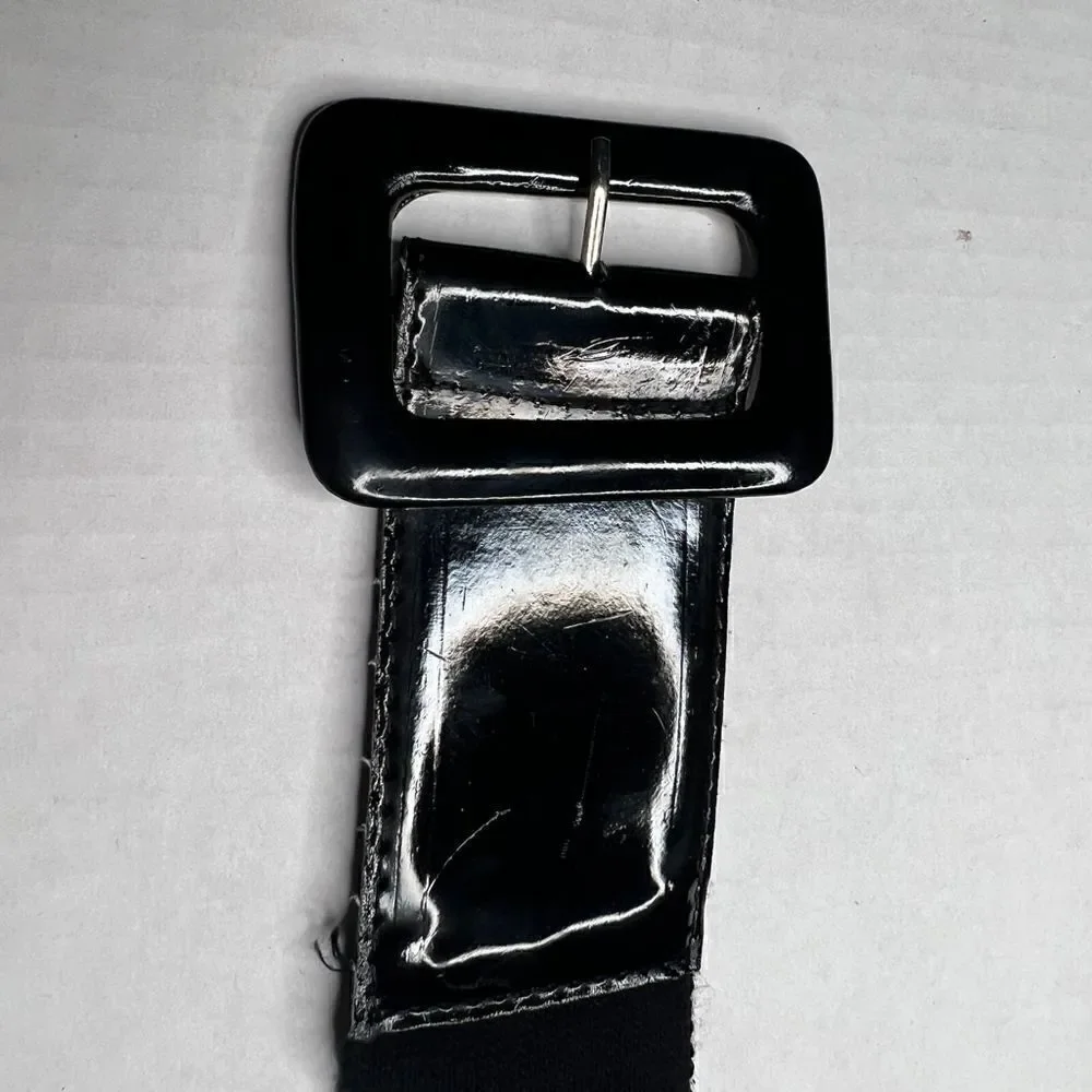 3/$15 or 5/$20 High waisted shiny black belt with elastic back 33”